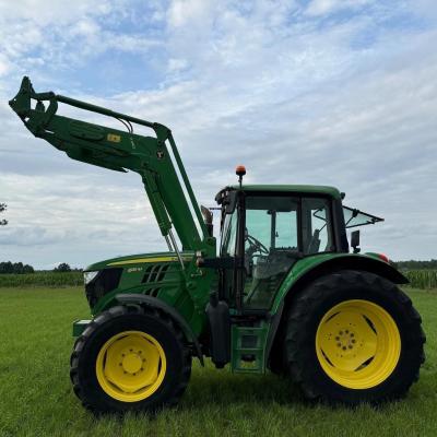 John Deere 6115 M z Turem