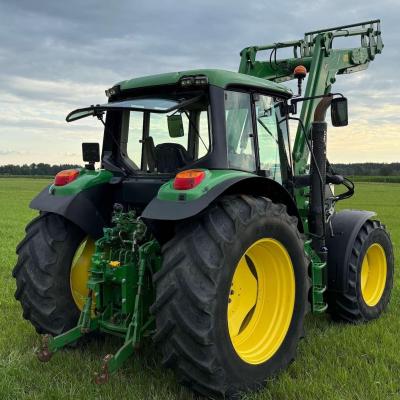 John Deere 6115 M z Turem